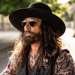 JOHN CORABI