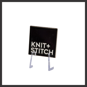 PIN BADGE WITH NEW KNIT + STITCH LOGO
